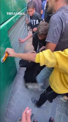 Boy Climbs Bus Window To Hug Freed Dad