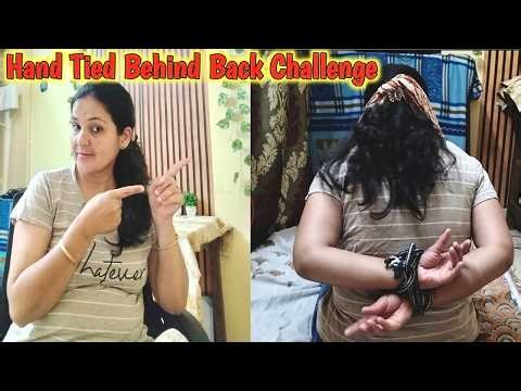Hands tied behind back on floor Challenge