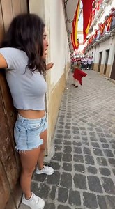 Terrifying Close Call! Woman Pinned Against Wall During Running of the Bulls 🎬This video was produced by Network Media and BlueAxis | This Better Work