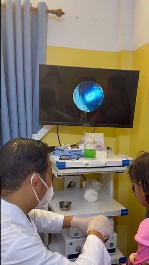 🤯 Watch the Giant Earwax Come Out! #earwaxremoval #doctor #shorts