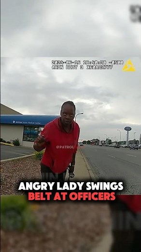 Angry Lady Swings Belt At Officers 😳