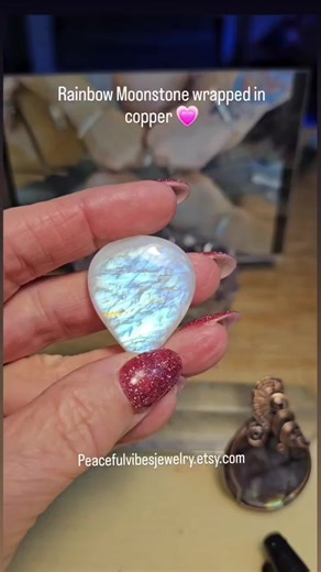 This Rainbow Moonstone has the most awesome front flash! I wrapped her up snug in solid copper wire with kindness and peaceful vibes for you to love on for many years 💗 Please tap the link in my bio @peacefulvibesjewelry for all the details on this one and many others. Much love to yall! ☮️❤️🤗 . #madewithlove #wirewrappedjewelry #handmadependant #peacefulvibesjewelry #rainbowmoonstonenecklace