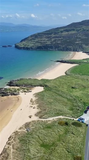 This is one of the most beautiful beaches in Ireland 🇮🇪😍 Donegal's Portsalon Beach is a sight to behold, even on days when the weather isn't playing ball ☂ It's about a 20-minute drive from Fanad Lighthouse and on a clear day, as you stroll along the sand, you'll be treated to magnificent views of the Inishowen Peninsula Music: "No Morning Finds Me" by Sacha Ende - CC BY 4.0 Video: Tourism Ireland by Gareth McCormack | The Irish Road Trip