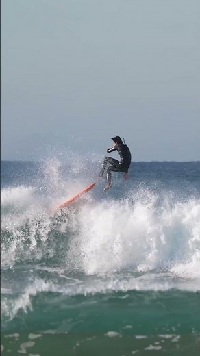 Feel the Rush: Surfer Conquers Epic Waves! 🌊