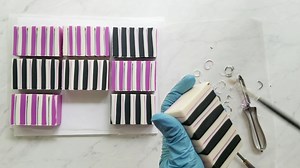 😍😍😍We've been obsessing over this gorgeous soap meticulously crafted by tutorial creator Tree Marie Soapworks this week! You can find the tutorial for this “In the Key of Purple” 💜🎹🖤 Cold Process Soap in our Learning Center at 👉 learning.elementsbathandbody.com/tutorial/in-the-key-of-purple-soap-recipe/ 💜💙💚 #soap #handmadesoap #soapmaking #artisansoap #soapmaker #handcraftedsoap #soapart #homemadesoap #beautifulsoap #beautifulsoaps #coldprocesssoap #cpsoapmaker | Elements Bath and Body