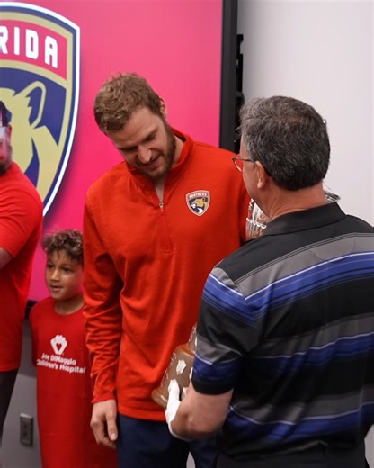 Honored to have kids from Joe DiMaggio Children's Hospital surprise Barky with the Frank J. Selke Trophy and the King Clancy Memorial Trophy! | Florida Panthers