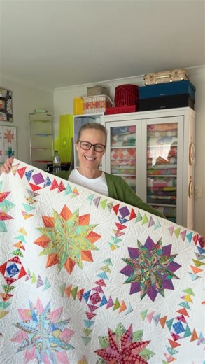 Emma Jean Jansen on Instagram: "• Quilts from the Cupboard • Pattern: Harlequin Stars by me Fabric: A colourful mix — lots of Kaffe Fassett and other bright beauties from the time Quilting: Custom longarm quilting by @vjquilts This Harlequin Stars quilt was made way back in 2011 and is actually the second version I stitched up — the first was raffled off to raise money by @victorianquiltersaus. And would you believe… I finally have a template set for this quilt — only took 14 years! The pattern 