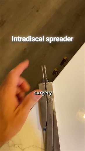 Lumbar total disc replacement (ADR) technique and the intradiscal spreader to restore disc height