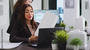Building engineer on videocall with technician to ensure suitable design elements, working with architectural crew to help with lines and manufacturing scale. Woman chatting on online teleconference.