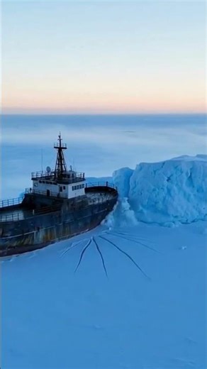 Icebreaker Ship Crushing Through Arctic Ice