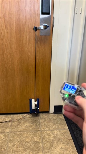 Using my PolyCast5 multi-tool remote to control my DIY door opener! Free tutorial linked in bio!