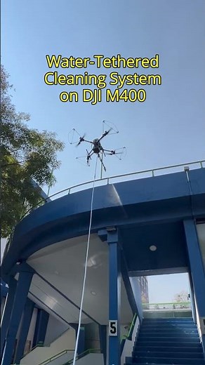 This Drone Cleans High-Rise Buildings From the Air Using a Water-Tethered System 🏙️ DJI Matrice 400