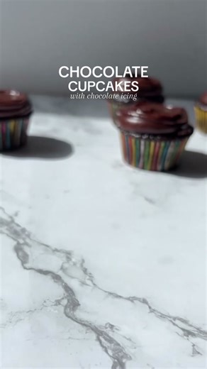 There’s pretty much nothing better than a chocolate cupcakes with chocolate icing, especially when it is a creamy chocolate ganache icing. These are the most commonly made cupcakes in our kitchen for good reason. They are simple, delicious, and packed with chocolate flavor. Ingredients Cupcakes: 1 ¾ cups all-purpose flour 210 g 2 cups granulated sugar 400 g ¾ cup unsweetened cocoa powder preferably dutch processed, 75 g 2 teaspoons baking soda 10 ml 1 teaspoon baking powder 5 ml 1 teaspoon salt 