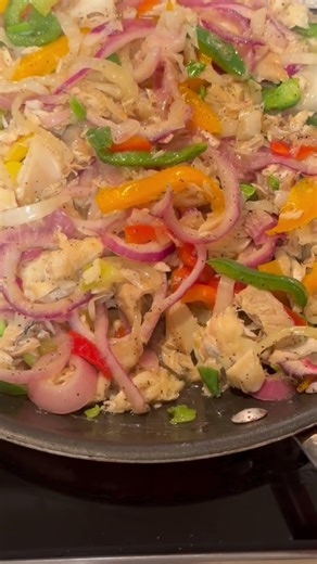 Salted cod fish w/onions, tomatoes and peppers