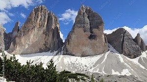 Full HD time lapse footage of Tre Cime with clouds moving impressively