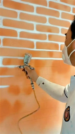 Creating a Realistic and Textured Brick Wall Effect Using Advanced Spray Paint Techniques