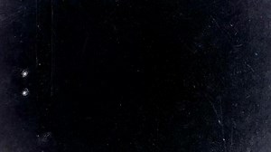 Textured dark background is designed for versatile media uses, ensuring appeal