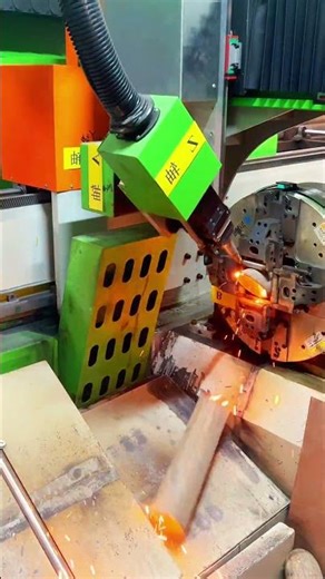 Sparks Fly: Automated Laser Cutter Precisely Shapes a Metal Pipe