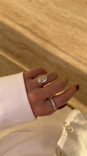 EARTHENA on Instagram: "This is how elegance stacks.🤍✨🌟🔥 A statement oval that catches every glance, paired with pavé that glows from every angle. Rings Featured 🤍The Ariela – 6.11ct Elongated Oval-Cut Diamond Hidden Eternity Halo Ring 🤍The Remi – Pavé Dome Diamond Ring oval cut engagement ring // Oval diamond ring // hidden halo engagement ring // pavé diamond band // luxury diamond ring // oval diamond engagement ring // Hailey Bieber inspired ring // Hailey Bieber inspired jewelry // mod