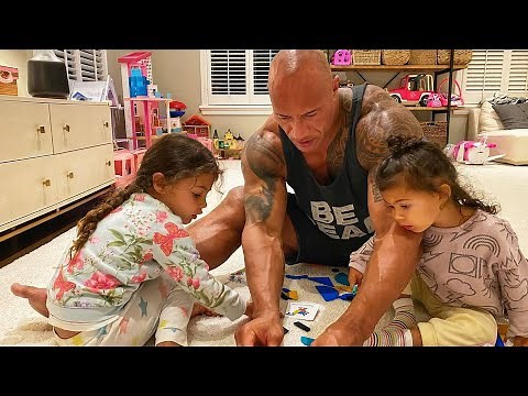 Full-blooded dad: The Rock plays so sweetly with his daughters