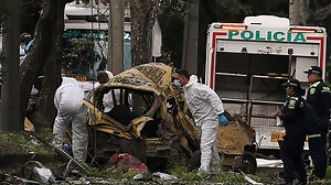 At least 18 dead as helicopter blasted out sky & car bomb explodes in Colombia