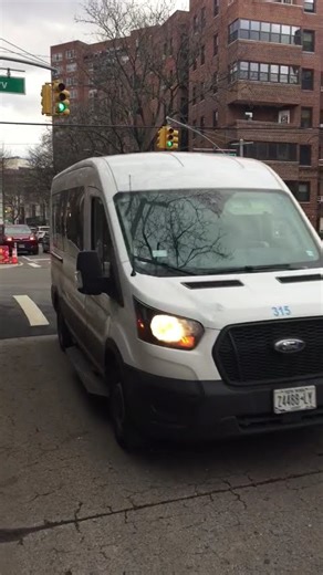 MTA Bus in action Q64 and ambulette van in action