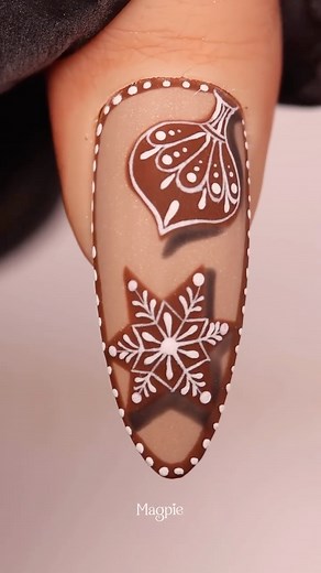 313K views · 10K reactions | Gingerbread but make it cute ✨ Frosted snowflakes + sugared details = festive perfection 癩❄️ #gingerbreadnails #magpiebeauty #everythingmagpie #snowflakenails #xmasnails #christmasnails | Magpie Beauty | Facebook
