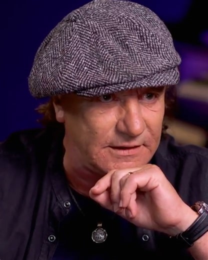 AC/DC's Brian Johnson talks about the difference between heavy metal and hard rock. | AXS TV