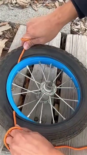 "The Most Clever Trick To Install A Bike Tire Using Ropes
