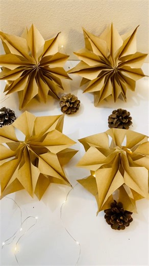 Simple, sustainable, and so stunning — paper bag snowflakes for a magical holiday touch. #snowflakes #christmas #diy | Yasu Crafts & Cords
