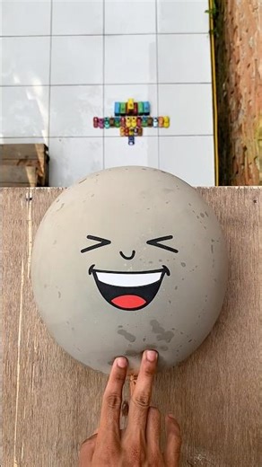 Experiment: Dropping emoji and polka dot water balloons from a height, will the balloons explode?