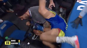 Ringside Photographer Saves Boxer from Fall After Brutal Knockout