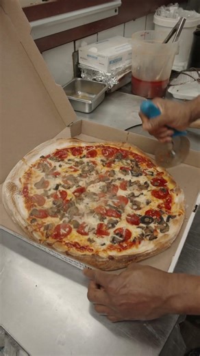 Classic Pepperoni Mushroom Onion Pizza Fresh From The Oven At Annie’s Pizza