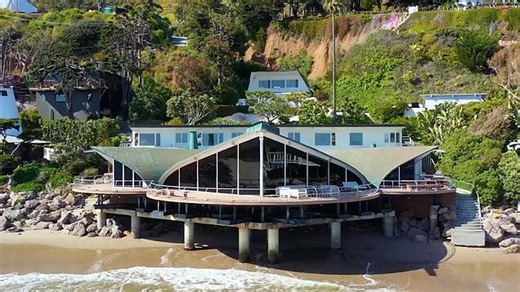 Inside the iconic 'wave' Malibu party pad once owned by Rod Stewart and Madonna's producer as supermodel Karli Kloss and husband Joshua Kushner snap it up for $29.5million