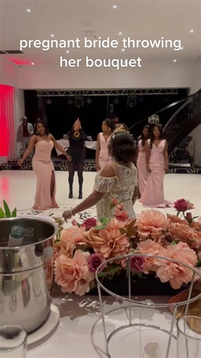 Happy pregnant bride