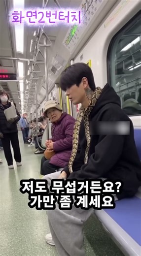 A young man who rode with a snake around his neck because it was cold