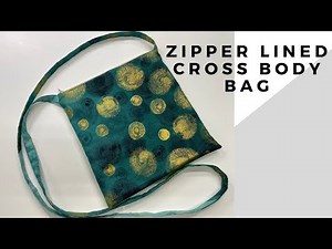 ZIPPER LINED CROSS BODY BAG