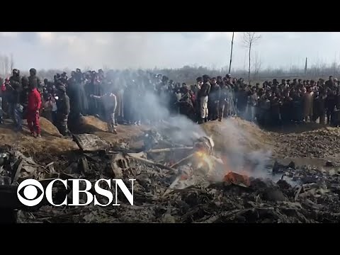 Pakistan shoots down Indian jet, captures pilot