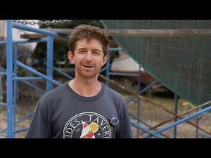 Tropical boatyard woodwork - repairing planks and painting the boat in a thunderstorm!