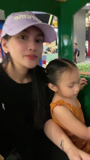 Mom and Daughter Joyride on a Train