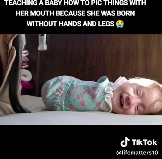 Teaching a Baby to Use Her Mouth for Picking Up Objects