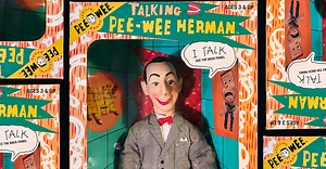 Performing surgery on a vintage Talking Pee-wee Herman doll to fix its broken voice box