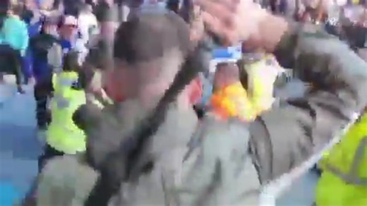 Celtic fan strikes Gers supporter with belt as punches thrown in shocking clash