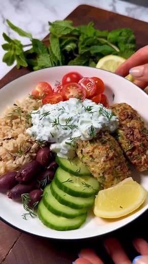 Chicken kofte protein prep bowl Cre by @emthenutritionist 390kcal per portion and 34g protein You will need to serve 4 500g lean chicken or turkey mince 1 courgette, grated 1 red chilli, finely diced Fresh chives, basil and parsley (2 tbsp chopped of each) 3 tbsp wholemeal bread crumbs 1 egg Zest of one lemon Generous pinch of salt and pepper For the protein tzatziki 200g 0% thick yoghurt 1/4 cucumber (3 inches) deseeded and finely diced 60g feta, crumbled 1 spring onion, diced 1 tbsp each chopp