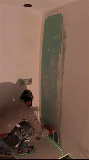 Working on Wall Alignment with Laser Level