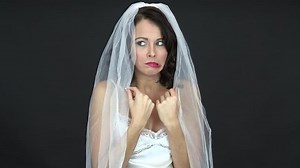clip-7964317-attractive-young-nervous-bride