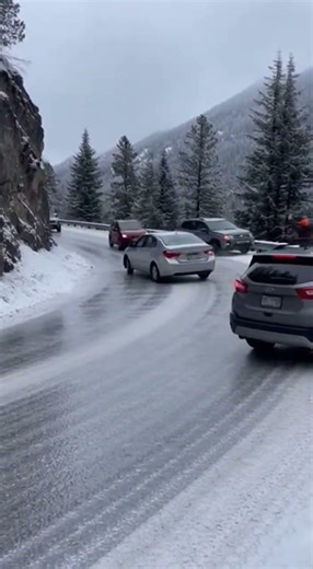 Black Ice Sends Cars Sliding on Mountain Curve 😨❄️ #automobile #instantkarma #police #roadrage