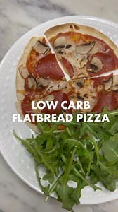 5.7K views · 88 reactions | This Low Carb Flatbread Pizza is everything! Run don’t walk to your kitchen and make this for your next lunch or dinner Ingredients needed:  1 Carb Sense Tortilla  1/4 Cup Pizza Sauce  1/4 Cup Mozzarella Cheese  4-6 Turkey Pepperoni  Veggies of choice  Pizza Seasoning Bake in a toaster oven (or regular oven) till cheese is melted. Then cut into slices and enjoy! Let us know how you liked this low carb meal ⤵️ | V Shred | Facebook
