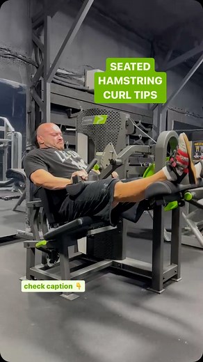 Dr. Mike Israetel on Instagram: "SEATED HAMSTRING CURL TIPS 👇 1.) Get as tight and secure in the seat as possible with the thigh pad as tight as possible with some comfort remaining. This lets you produce more force with your hams. I have to push on the pad with my hands to get the most stable. 2.) Set the machine to get you as big a range of motion at the top stretch as possible. Full loading all the way to straight knees is awesome. 3.) Any speed on the concentric is fine, but a contro