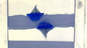 Liquid can levitate and boats can float upside down in this gravity-defying physics experiment. Researchers discovered a peculiar phenomenon that allows lightweight objects to float on the bottom surface of this liquid, with a kind of reverse-buoyancy. | Nature Portfolio